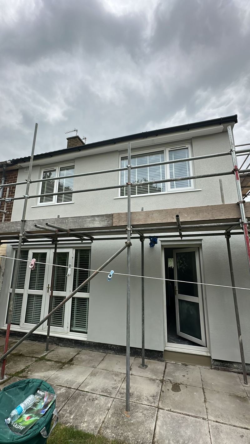 Rear elevation part-way through rendering, scaffold still up